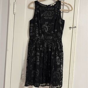BB Dakota Women’s size 4 black dress with leather flowers and sheer back